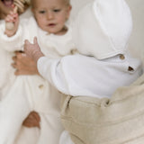 ‘ Dove ‘ Knit Playsuit